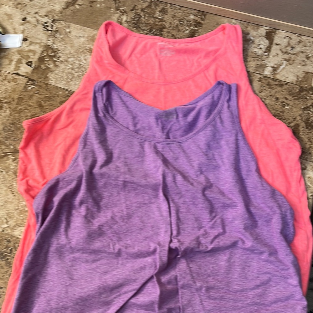 Pink and purple Lane Bryant swing tanks